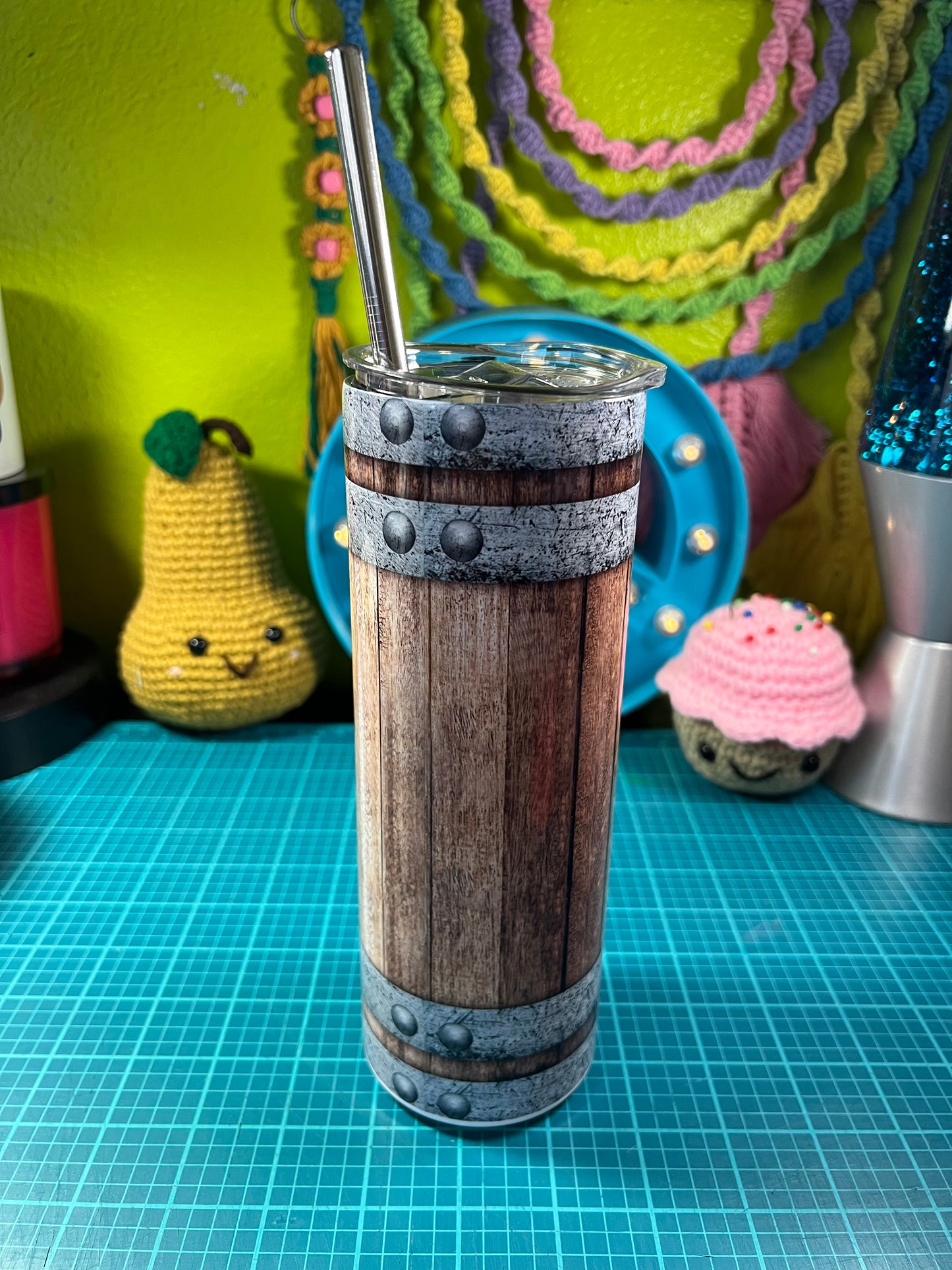 Tumbler has a sublimated design printed on the tumbler and comes with a reusable straw and plastic lid. 