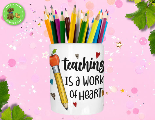 Teaching is a Work of Heart ceramic pen and pencil holder displayed with set of colored pencils