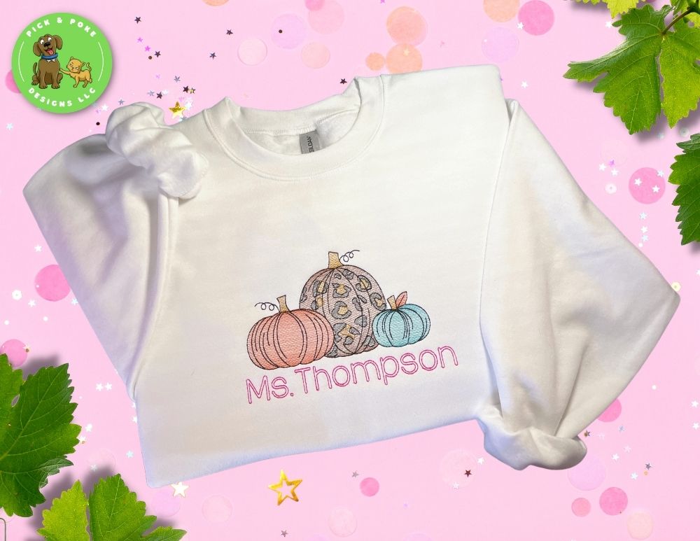 Personalized Fall Pumpkin Teacher White Crewneck Sweatshirt | Embroidered Cheetah and Teal Pumpkins