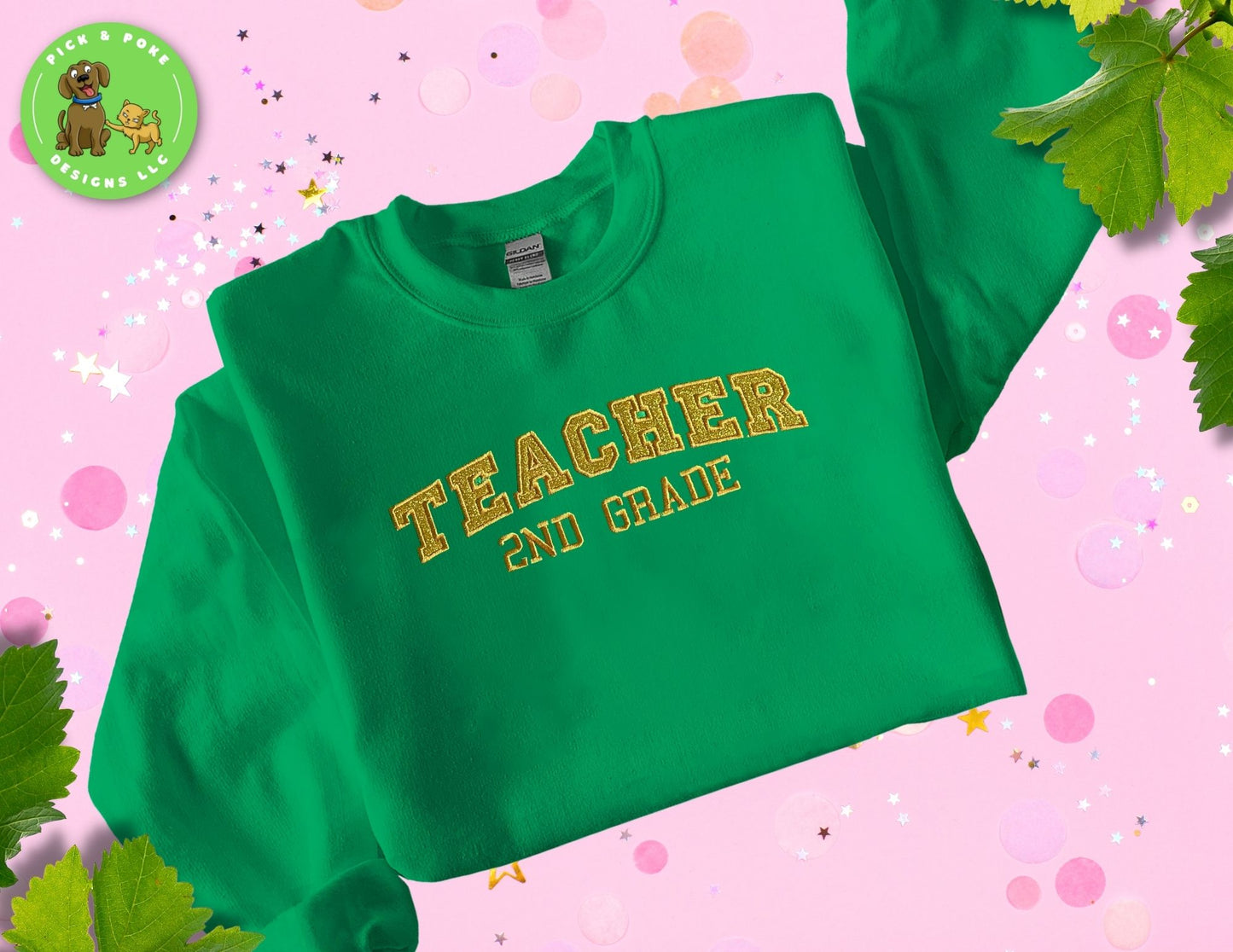 Green sweatshirt with golden text that reads 'Teacher' and the words 'Second Grade' below it